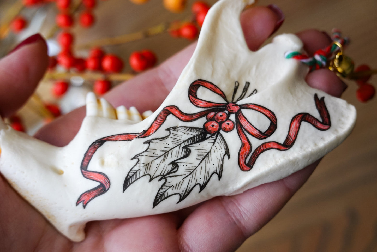 Painted beaver jaw "Holly",  bone ornaments